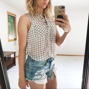 Sleeveless button up high v neck semi sheer blouse